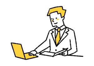 パソコンを見ながら文書を作成する男性サラリーマン